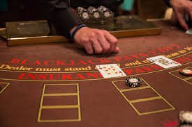 Mobile phone displaying live poker table with adaptive bitrate streaming